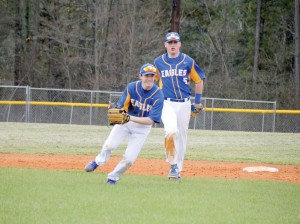 Cameron Cooper backs up as RWA second baseman Matt Taylor scoops up a York Prep grounder Monday and looks to first. (Photo/Martha Ladd)
