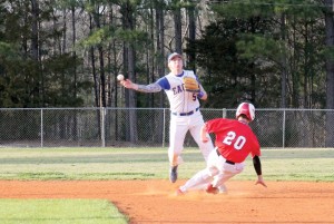 RWA shortstop Cameron Cooper steps on the bag, avoids the slide and turns the double play against Great Falls. (Photo/Martha Ladd)