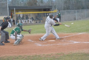 Fairfield Central’s Travius Williams belts one down the third base line Tuesday against Eau Claire. (Photo/Joe Seibles)