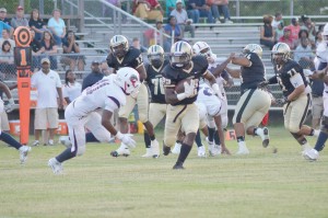 Jerrell Suber-Oneal (22) outflanks Chester's Quay Strong on his way to the first down. (Photo/DeAnna Robinson)