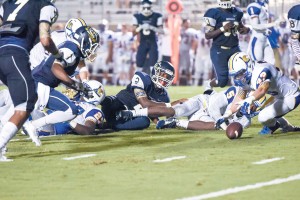 David Isreal watches as his fumble rolls into the hands of Lexington's Bobby Whitworth. (Photo/Kristy Kimball Massey)