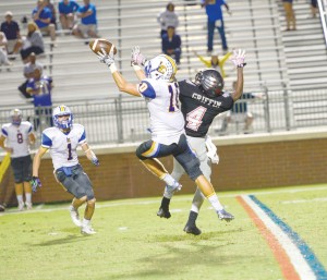 Lexington's Alston Stewart (10 breaks up Jalen Smith's pass to Malik Griffin (4). (Photo/Ross Burton)