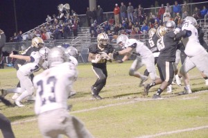 Jerrell Suber-O'Neal blasts through a hole in the Powdersville line. (Photo/Joe Seibles)