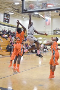 Akyel Richmond polishes the glass vs. Eau Claire Tuesday. (Photo/DeAnna Robinson)